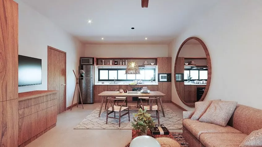 Una sala, cocina, sofa y un espejo grande en Casa Habanero