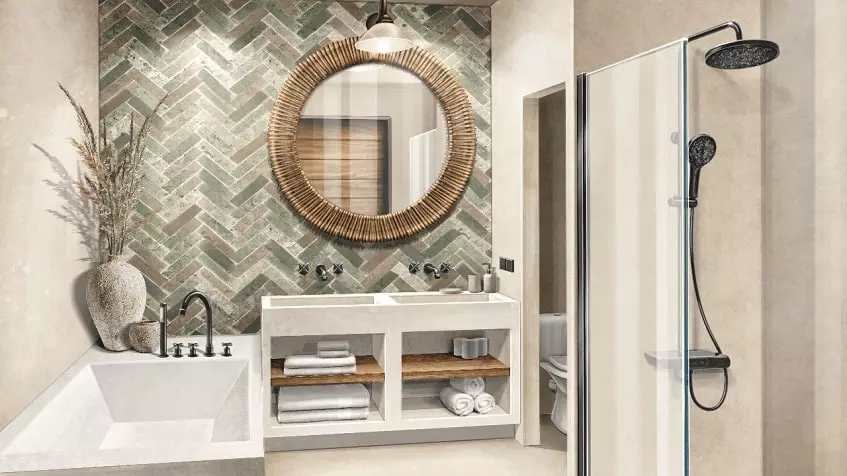 Une salle de bains complète et moderne avec un miroir circulaire, une douche et des serviettes à l'Adhonai Tulum.