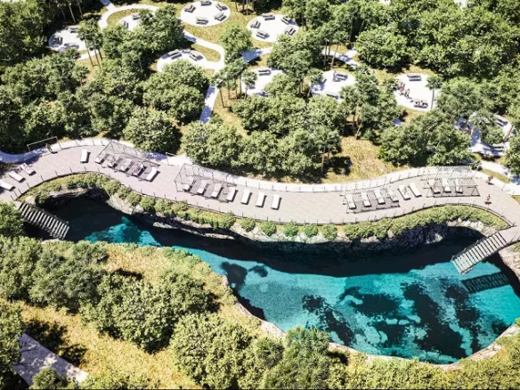 Vista aerea de un cenote en Sanam Country Club