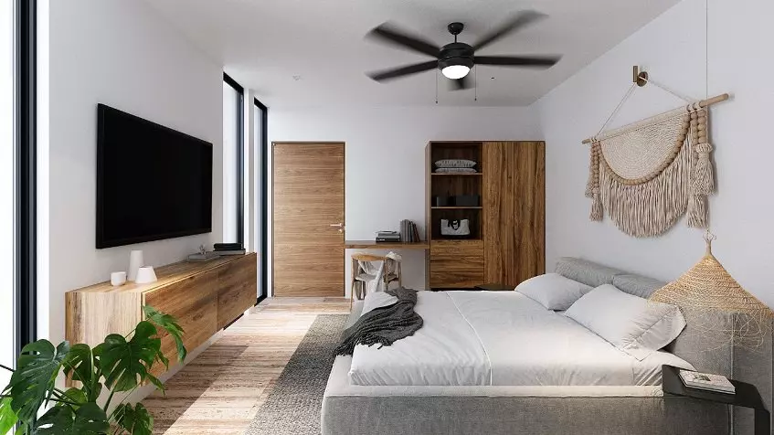 Una recamara con una cama king size en Maresol Playa Estudios