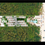 Aerial view of buildings on the beach at Aqualuna Tulum