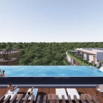 Une terrasse de piscine avec vue sur la jungle au Mayan View Tulum