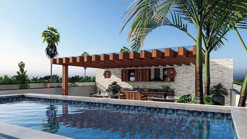 Una alberca y una terraza en Zenith Tower Playa del Carmen