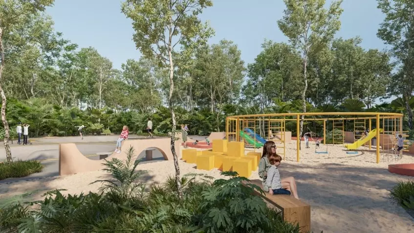 Un parque de juegos con niños y adultos en Lunara Akumal