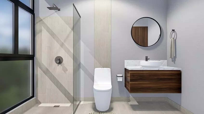 Un baño con un excusado y un lavamanos en Zenith Tower Playa del Carmen