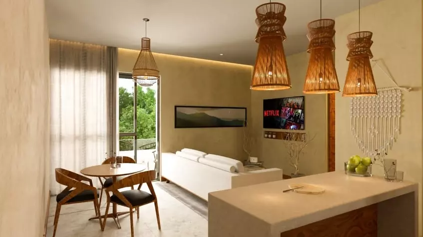 Una sala comedor y una tv en Monarca 28 Beach Town