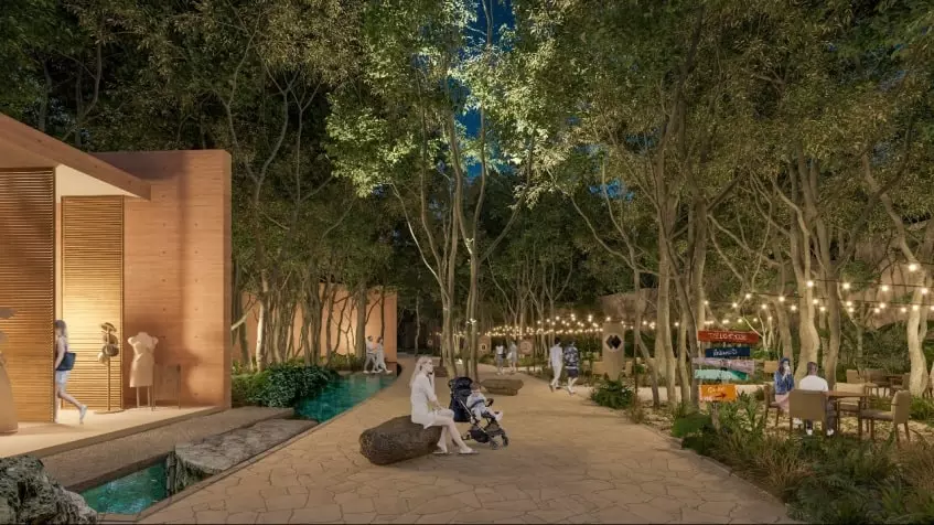 Un area comercial con personas caminando alrededor en Lunara Akumal
