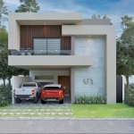 Una fachada de una casa de 2 niveles con 2 carros estacionados en Valenia Residencial Playa del Carmen