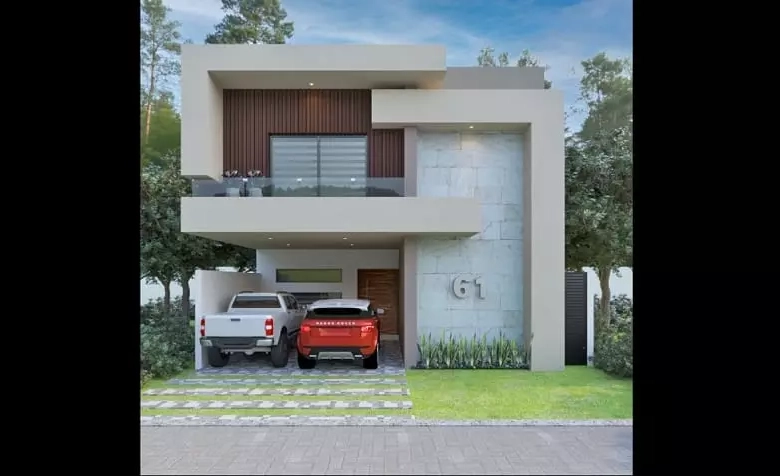 The facade of a two-story house with two parked cars in Valenia Residencial Playa del Carmen