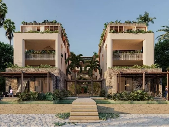 Facade of two houses overlooking the beach in Bahia Tulum