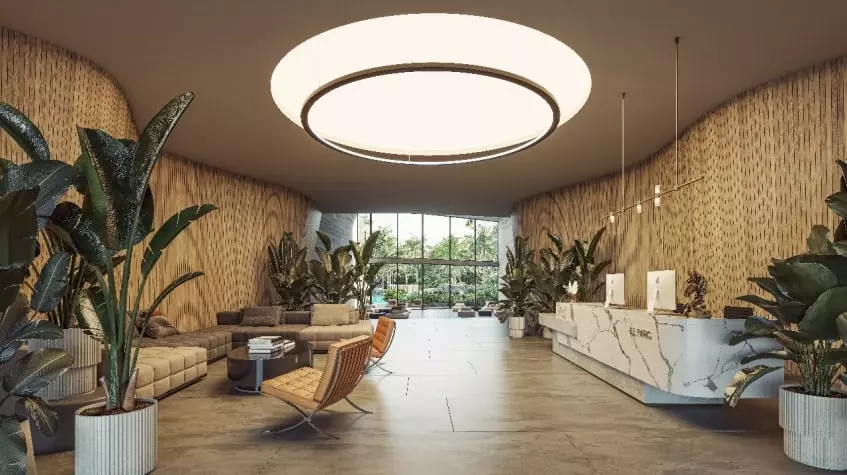 Un lobby con sofas y una ventana grande en Le Parc Cancun