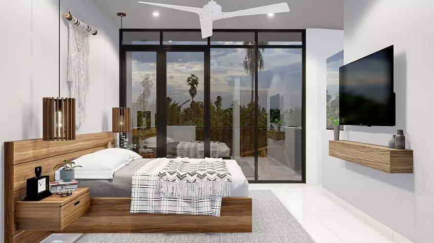 Una recamara con una terraza en Zenith Tower Playa del Carmen