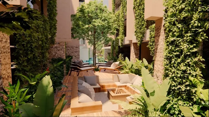 Un area lounge con plantas alredero en Kuxtal Luxury Residences Tulum