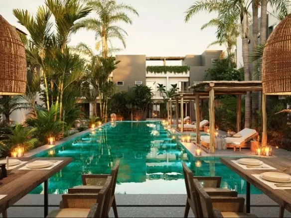 A pool and a restaurant at Fabula Tulum
