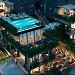 Vue aérienne d'une piscine et d'une terrasse à Aguacate Tulum