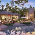 An ice cream shop and a river in front of it in Nativo Tulum