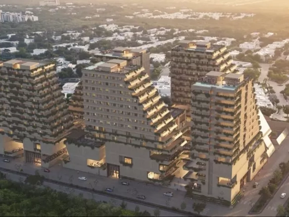 Vista aérea de edificios piramidales y coches alrededor en Aantik Mérida