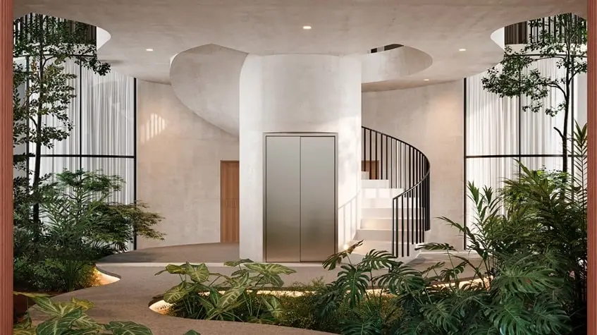 Un elevador, un jardin y escaleras al lado en The Curve Tulum