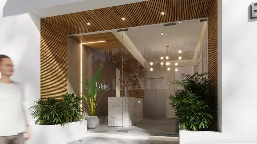 main-entry-elysium-elevator-elysium A main entrance and elevator in the background at Elysium