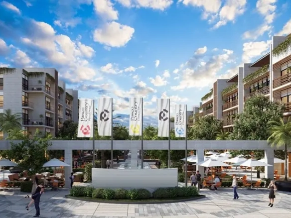 Una entrada principal a una plaza comercial en Paseo Country Downtown Merida