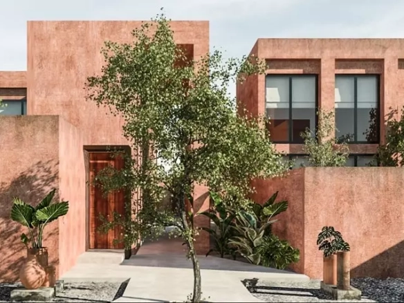 Fachada de una casa con un arbol enfrente en Casa Valkimia