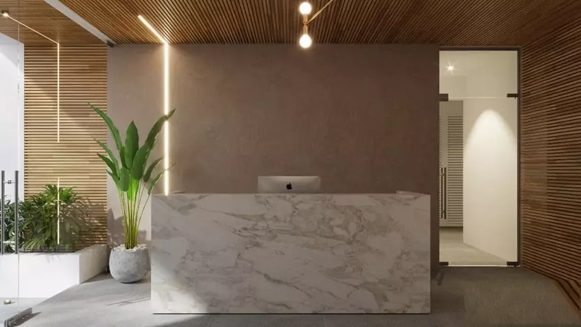 reception-elysium An illuminated reception desk and computer in Elysium