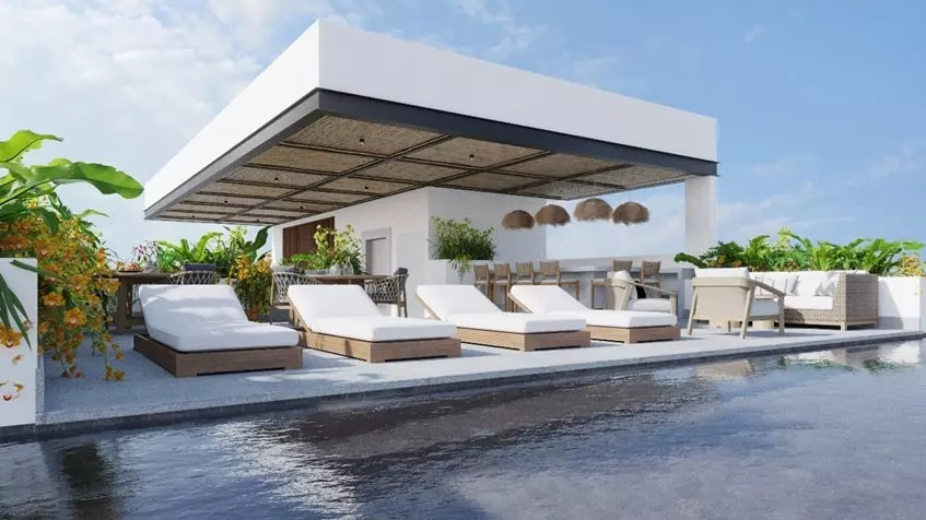 terrace-elysium A terrace with lounge chairs and a pool at Elysium