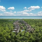Aerial view of a real estate development in the middle of the jungle in Faena Tulum.