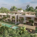 Aerial view of an apartment building and a pool at Casa Chaak