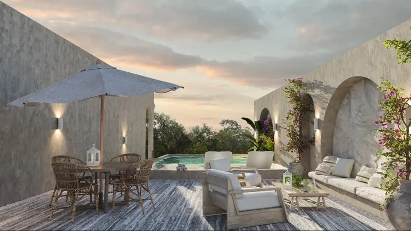 A rooftop terrace with a private pool and umbrellas at Ardeh Tulum