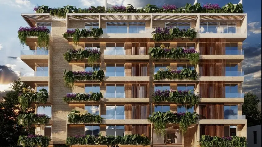 Fachada de un edificio de departamentos en Idilik Residences Playa del Carmen