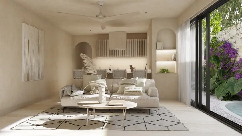 An open living room with a terrace with plants at Ardeh Tulum