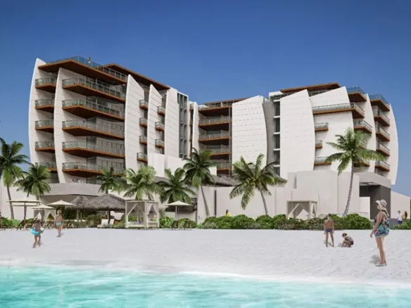 Front view of the sand lounge chairs at the seaside of Saint Marine Playa del Carmen