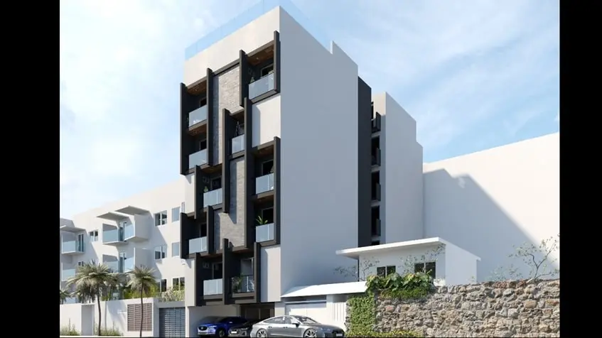 Fachada de un edificio de departamentos visto desde la esquina en Black Savage Playa del Carmen