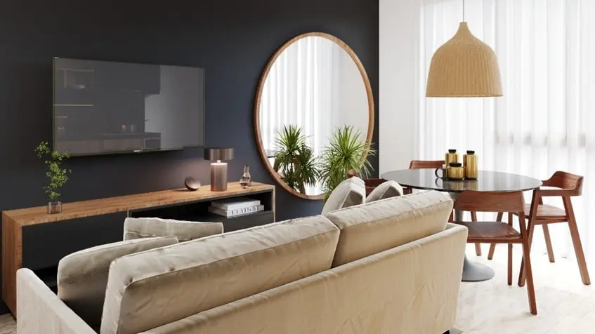 Un sofa con un area de tv y un comedor en Black Savage Playa del Carmen