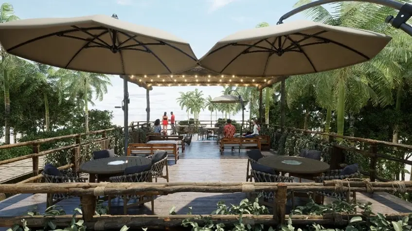 Un area de snack bar con vista al mar en Najau Telchac
