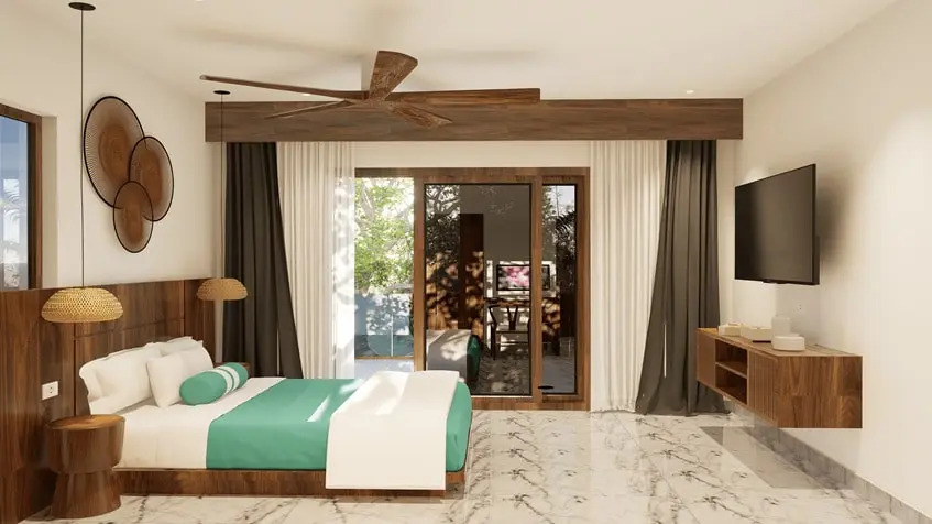 Una recamara con tv y un ventilador en Villas Cercle Tulum