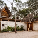 A jungle hut facade at Jungle Keva Tulum