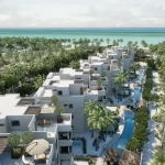 An aerial view of oceanfront apartment towers in Najau Telchac