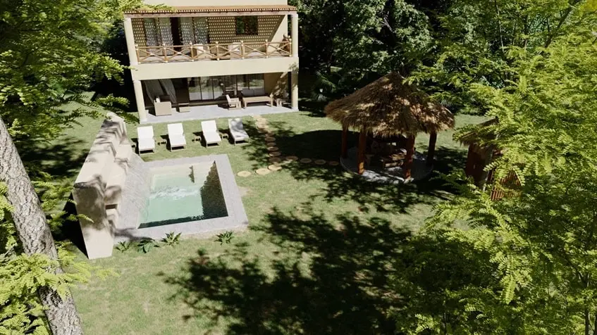 Vista aerea de una alberca y un jardin grande en Villas Cercle Tulum