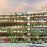 Una fachada principal de un desarrollo inmobiliario nuevo en Amara Tulum