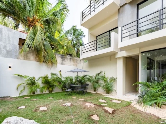 Garden with plants at Amanecer Condos in Playa del Carmen
