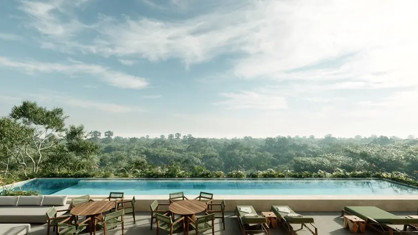 Una alberca en una terraza con vista a la selva en Entreselvas Merida