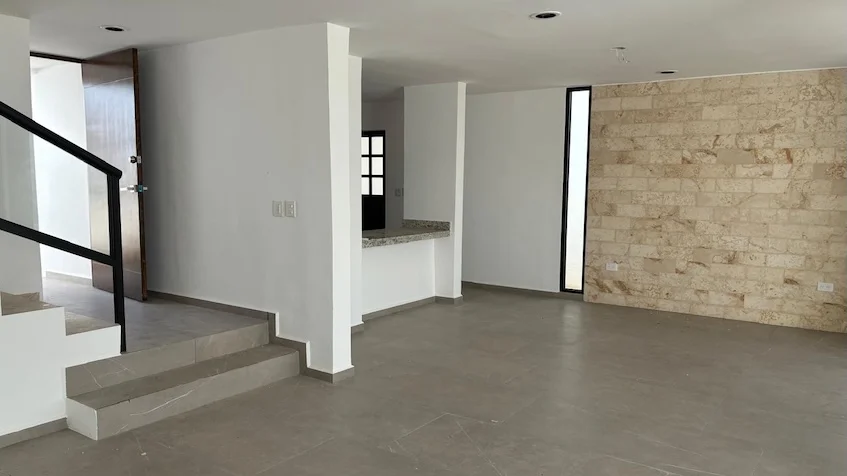 Sala con cocina escaleras en Adara Merida