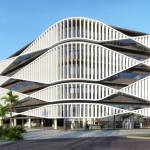 una fachada exterior de una entrada principal en luximiamed puerto cancún