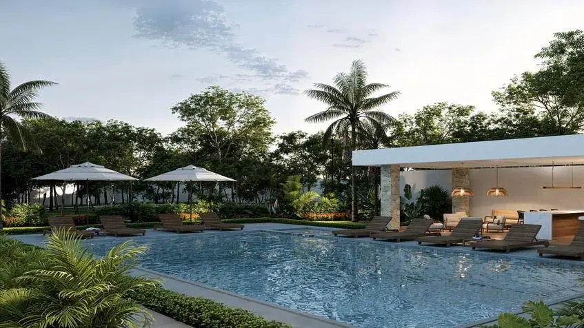 Alberca con camastros en Balche Villas Tulum Country