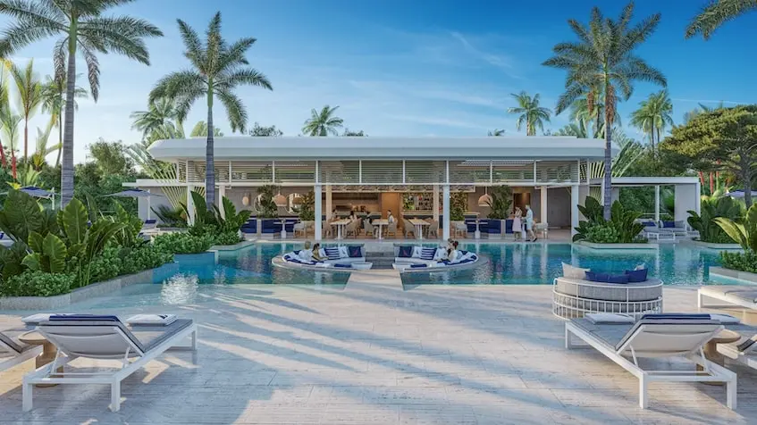 Piscine avec chaises longues à Nautica Residences Cancún