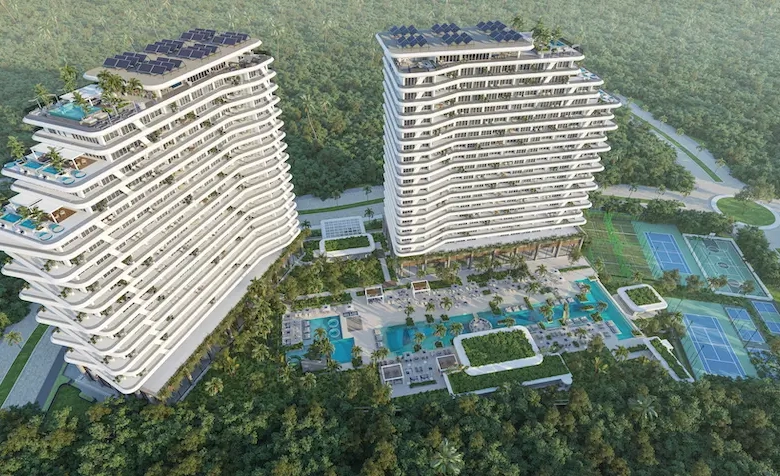 Vue semi-aérienne de deux tours de Nautica Residences Cancun