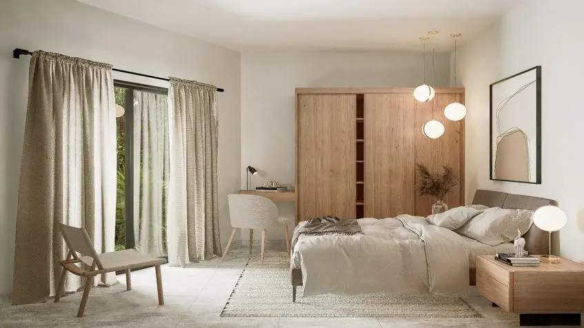 Bedroom with chandelier and window in Tulum Country Club House