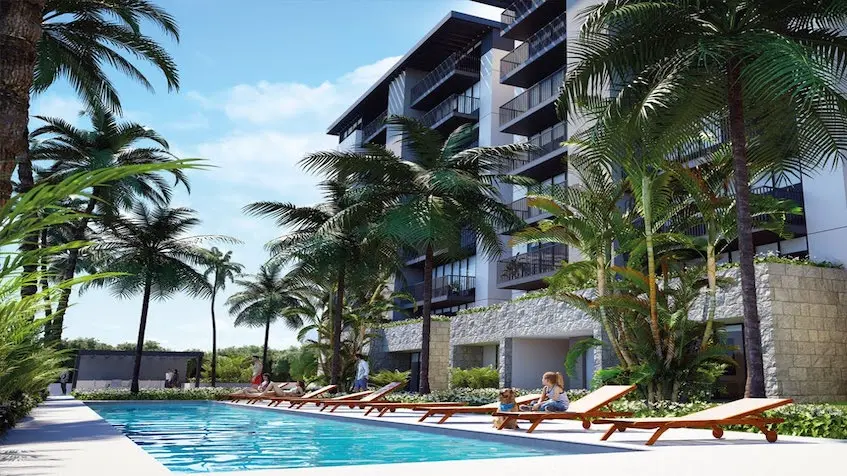 Piscine avec chaises longues à Agua 9 Cancún à Via Cancún